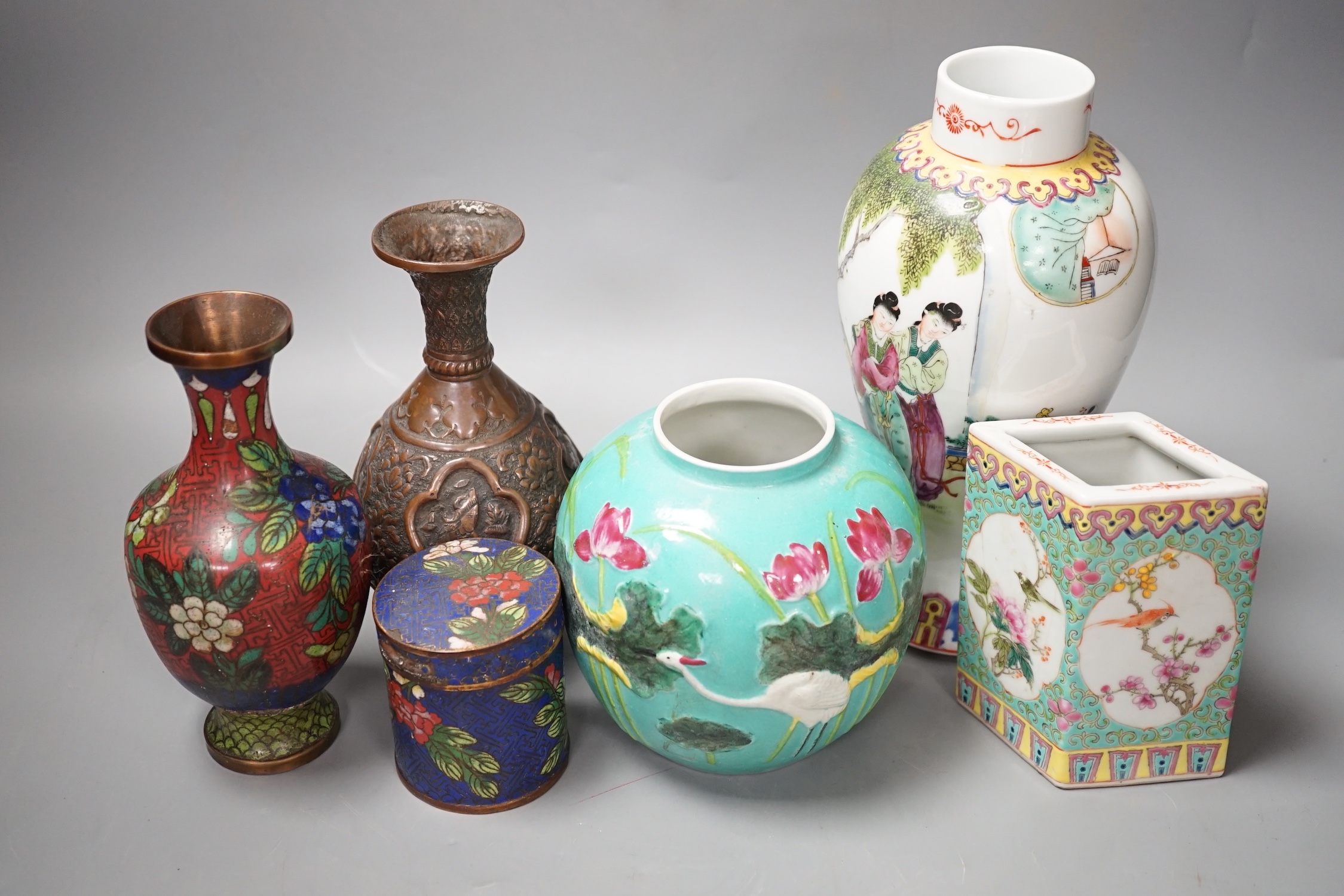 A group of Chinese porcelain vases, a cloisonné enamel vase and pot and a Middle Eastern metal vase, tallest 23 cm